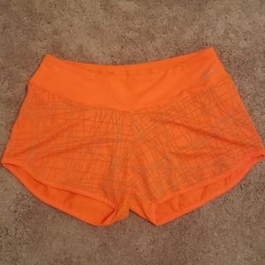 Like new! Asics running shorts